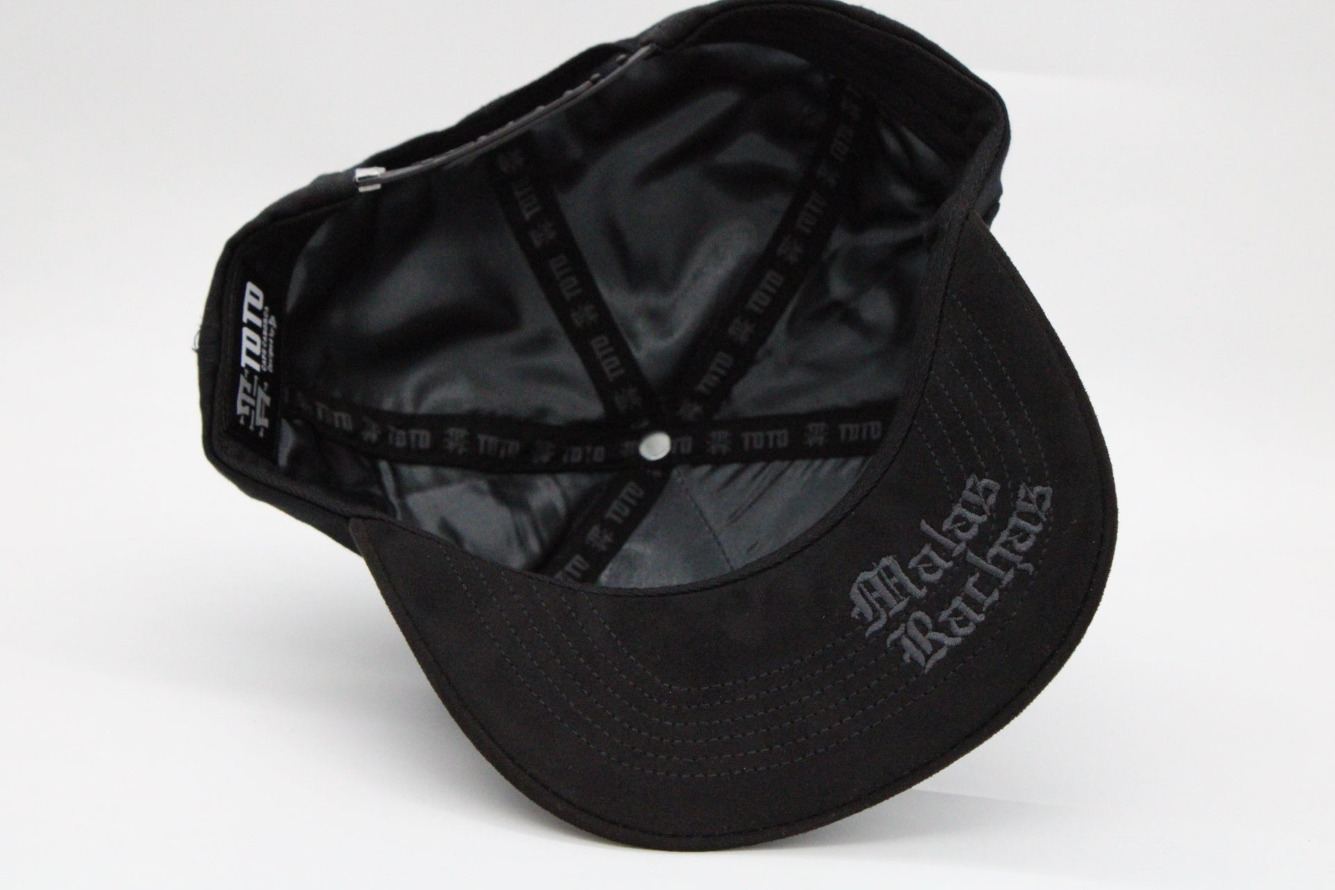 Gorra Toto Hats "Mala-Buena Racha Negra. x Tony Aguirre"